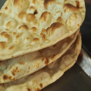 Plain Naan | (Regular) £1.75 (Add Butter) £1.90  (Large) £3.49 (Add Butter)